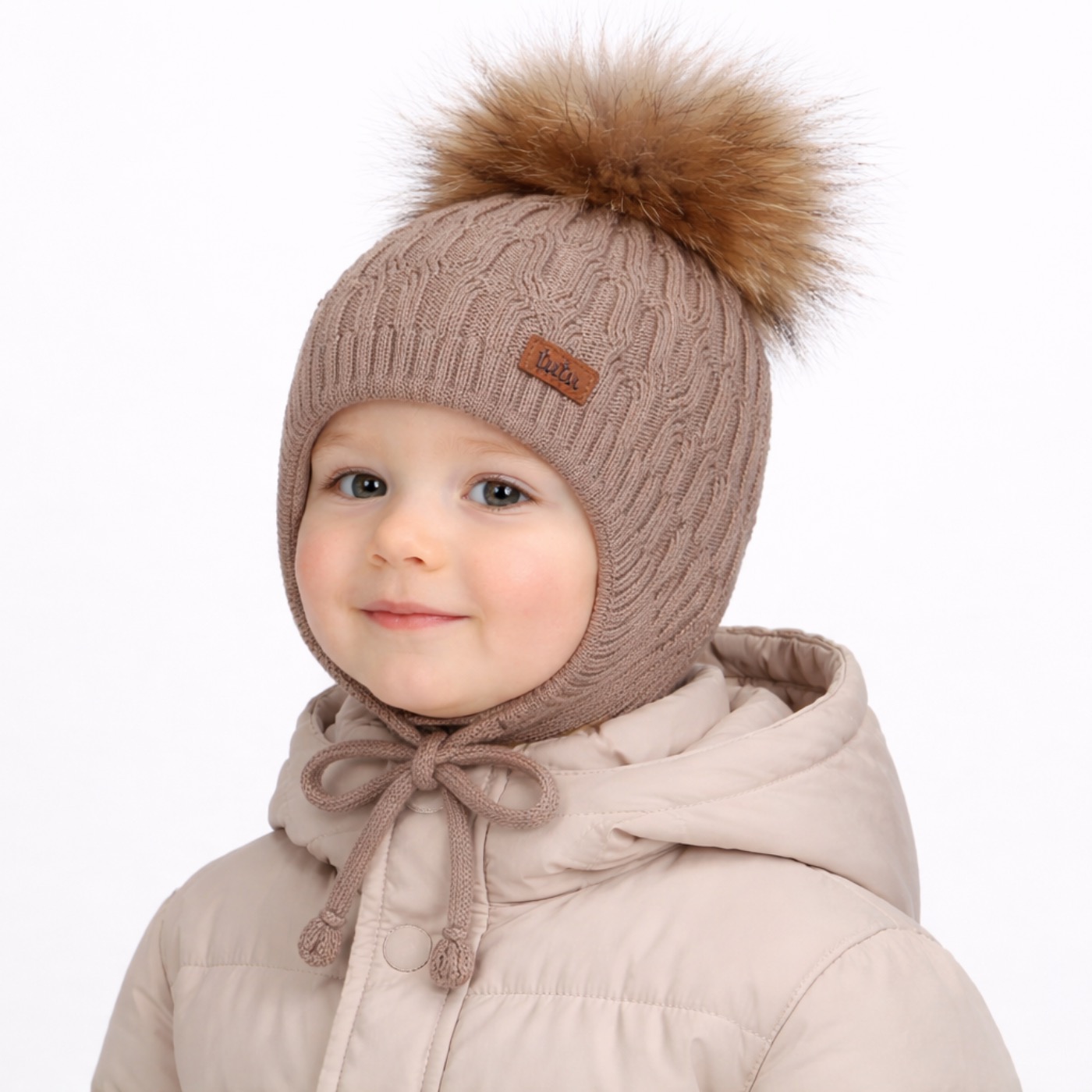 Thalaris cable-knit hat with pompom