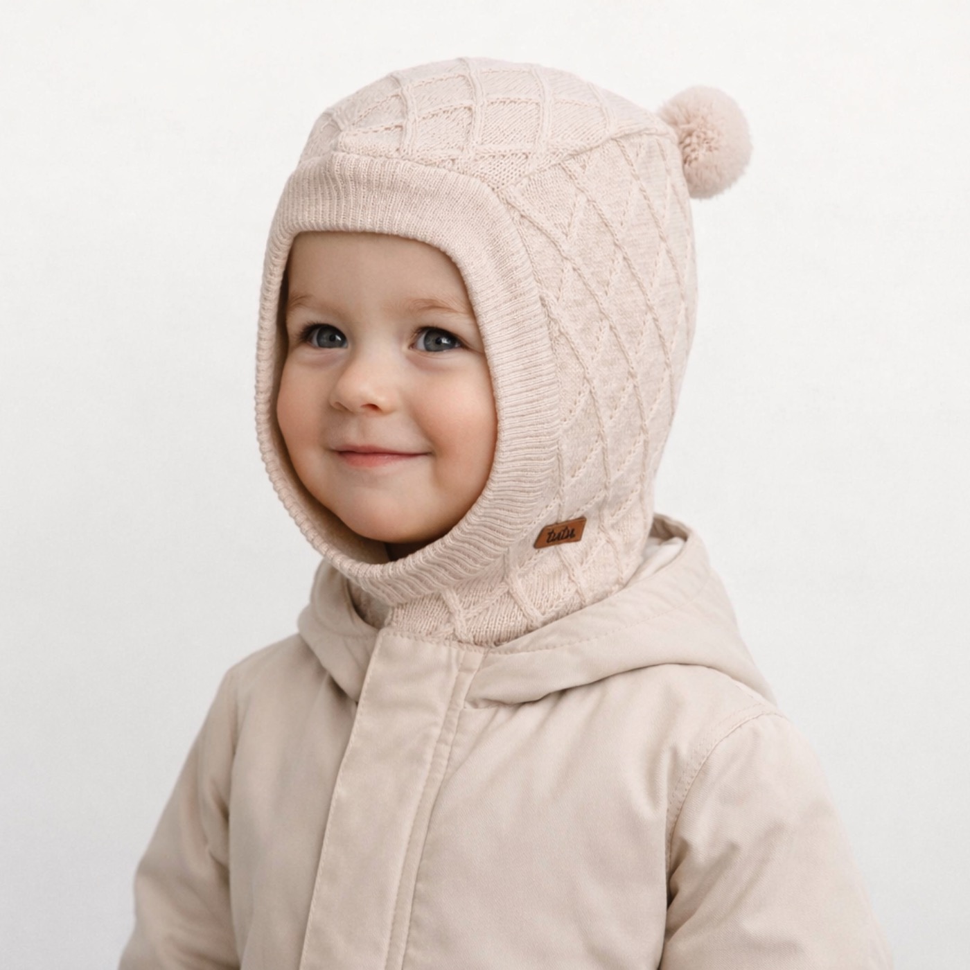 Lunereron knitted balaclava with pom-pom