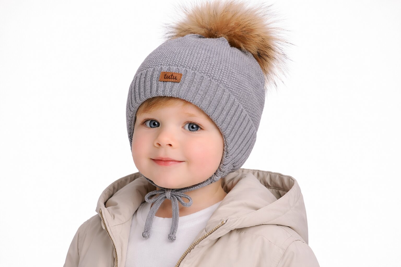 Vionaire merino wool tie-on cap with pom pom